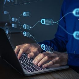 Person working on computer with cyber security