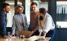 Group Of Business People Having A Meeting In A Tech